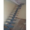 Escalera interior a medida con zanca central